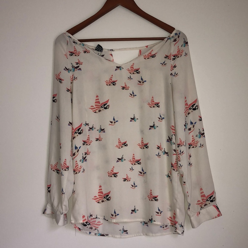 cream abstract bird print shirt